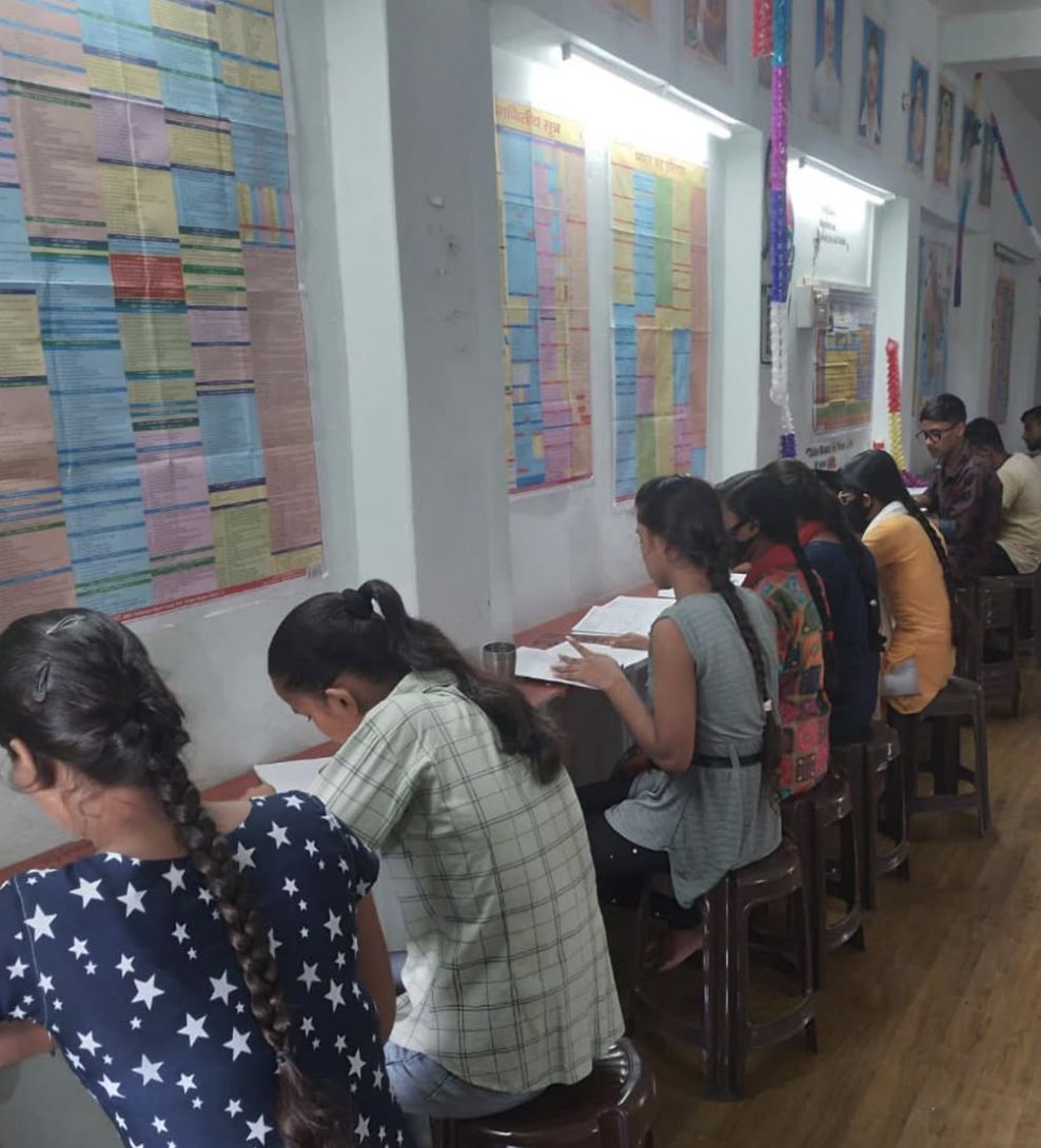 Students studying at Jana Vidya Foundation free learning center in Prayagraj